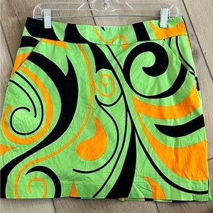 Loudmouth golf skirt w/built in shorts . 2 pockets on front & 2 on back